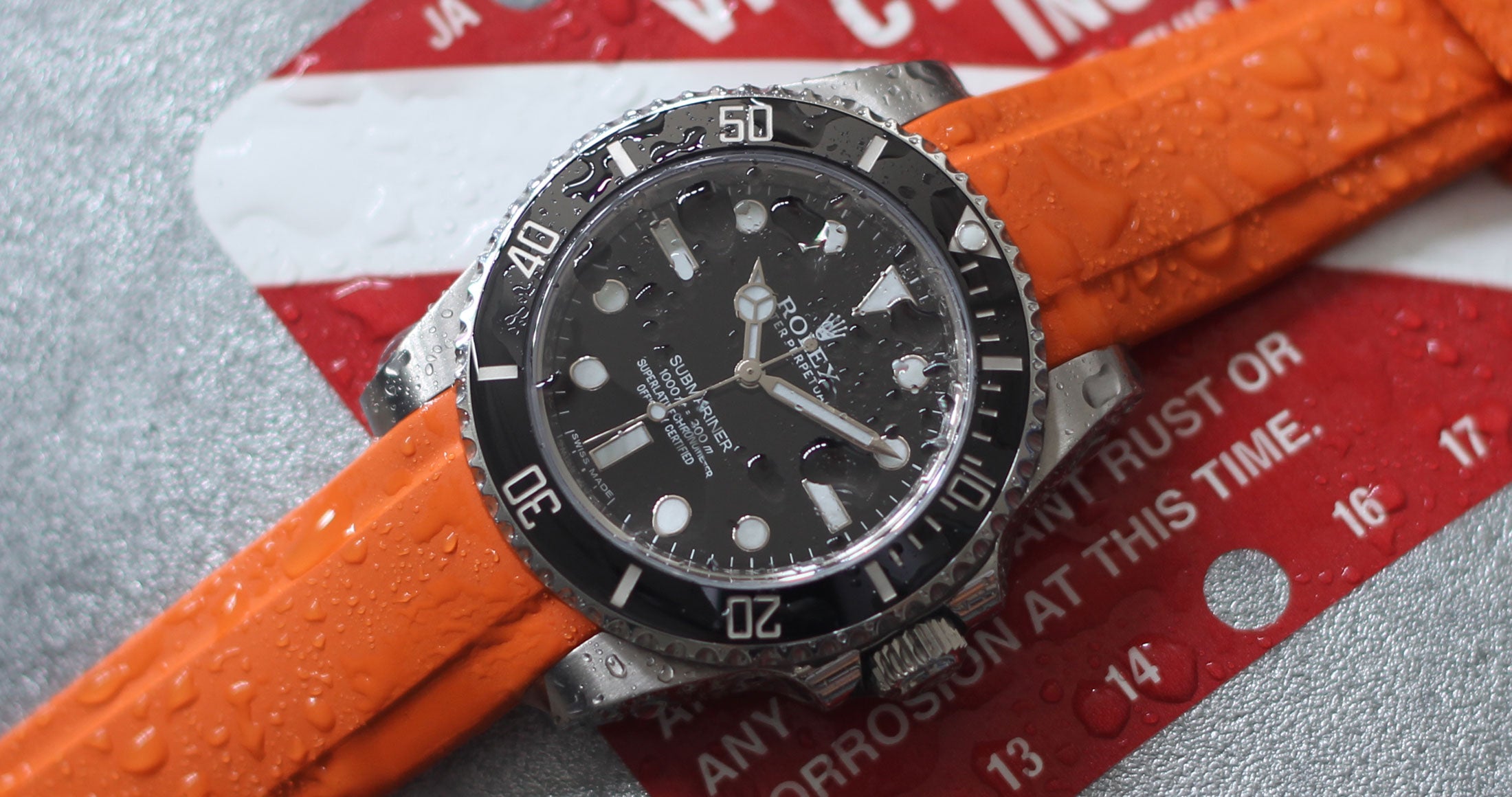 Rolex Submariner on Orange Rubber strap